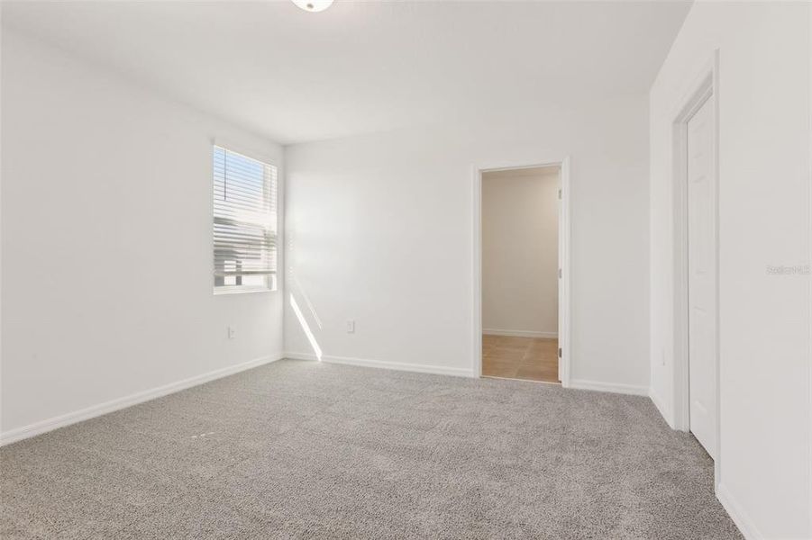 Spacious, unfurnished interior of a new home in Springs at Lake Alfred - Signature Series, Lake Alfred (Image 21).