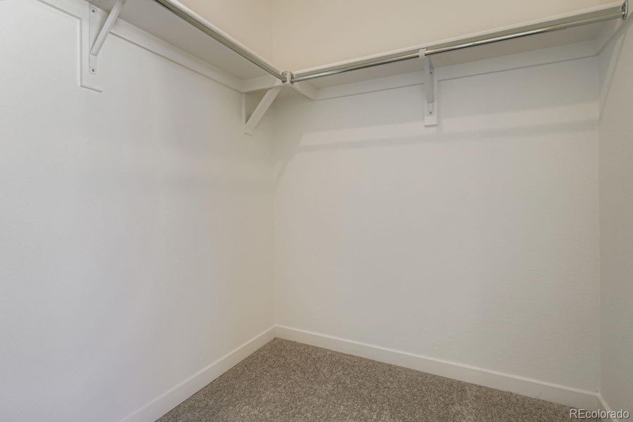 Spacious, unfurnished interior of a new home in Parterre: The Parkside Collection, Thornton (Image 9).