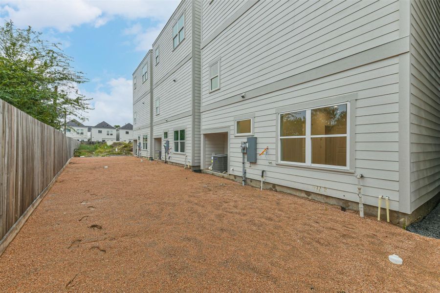 Exterior details and patio area of a home in , Houston (Image 24).