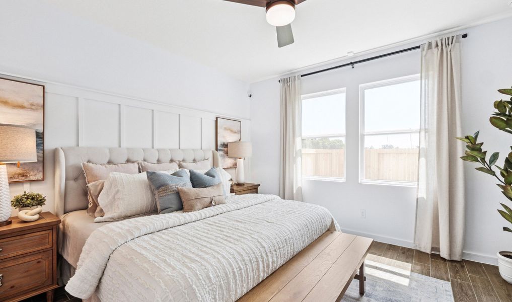 Primary suite with decorative feature wall