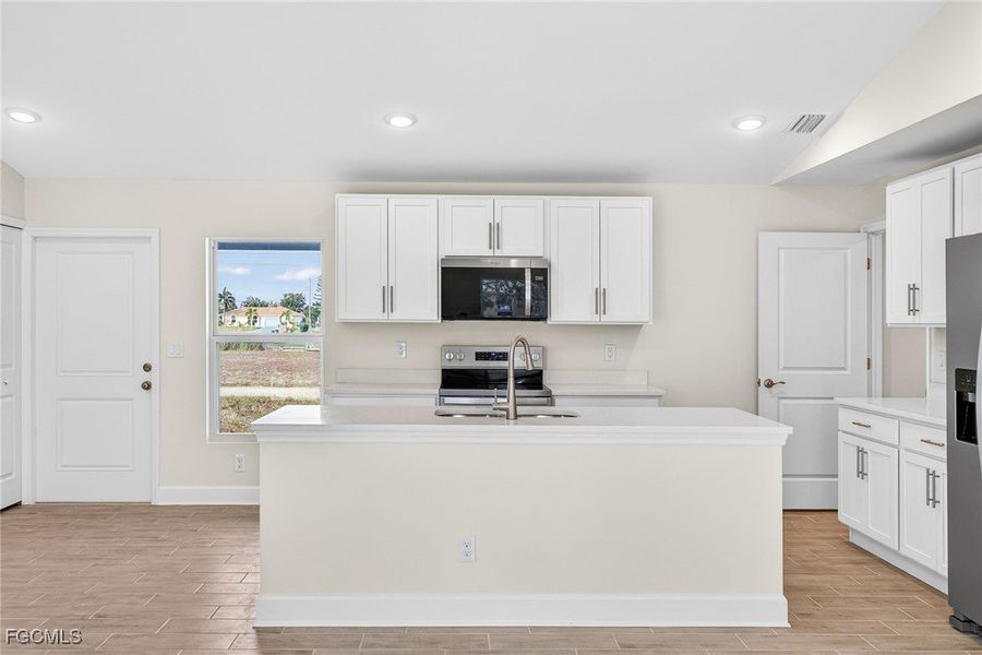 Furnished interior view inside a new home in Cape Coral, Cape Coral (Image 10). Furnished interior view inside a new home in Cape Coral, Cape Coral (Image 10).