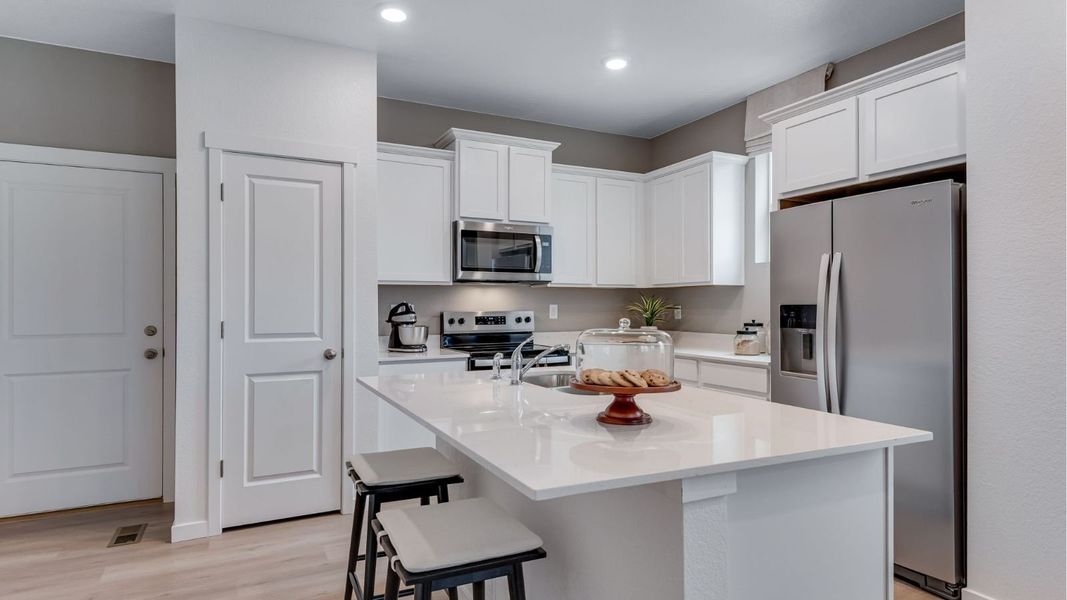 Furnished interior view inside a new home in Vista Meadows, Fort Lupton (Image 7).