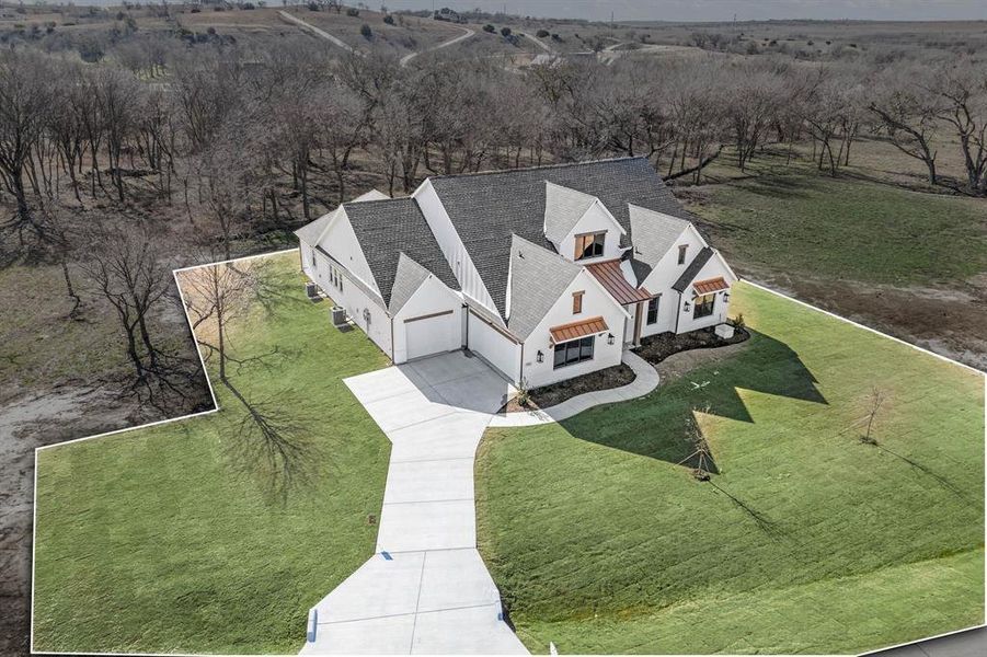 Front exterior of a new home in Rolling Creek Ranch, Aledo, TX, highlighting curb appeal (Image 21).