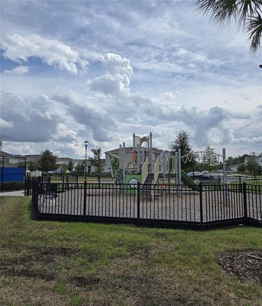 Front exterior of a new home in Isles of Lake Nona, Orlando, FL, highlighting curb appeal (Image 14).