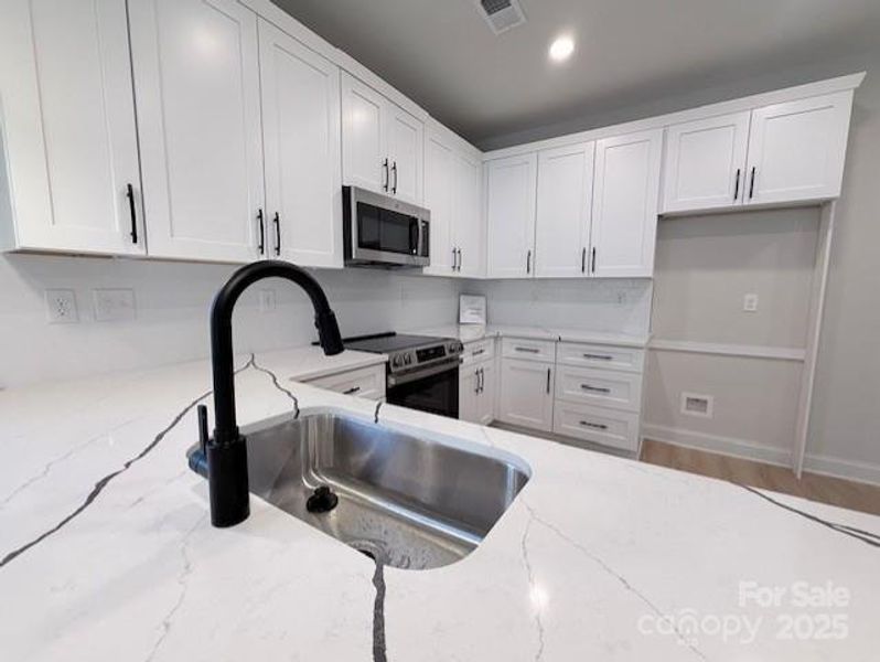Furnished interior view inside a new home in , Gastonia (Image 17).