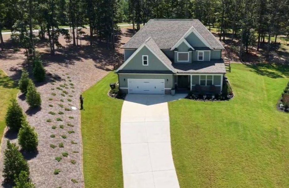 Front exterior of a new home in Griffin Manor, Cartersville, GA, highlighting curb appeal (Image 22). Front exterior of a new home in Griffin Manor, Cartersville, GA, highlighting curb appeal (Image 22).