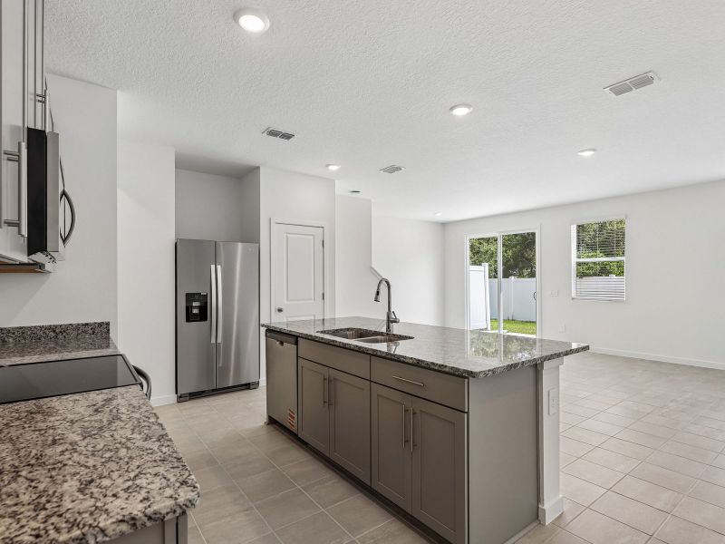 Furnished interior view inside a new home in The District at Oakleaf - The Grove, Middleburg (Image 4).