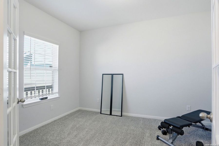 Spacious, unfurnished interior of a new home in Hunter's Ranch, San Antonio (Image 22).