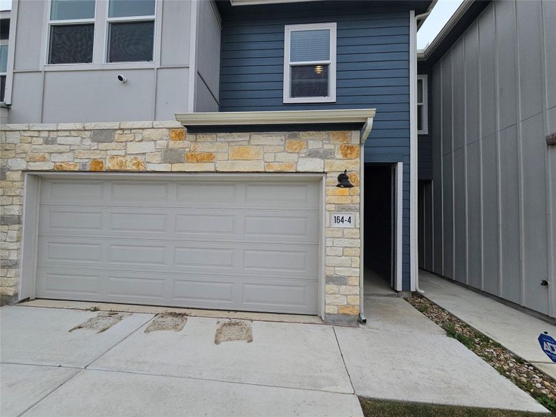 Exterior details and patio area of a home in Waterstone Village, Kyle (Image 2).