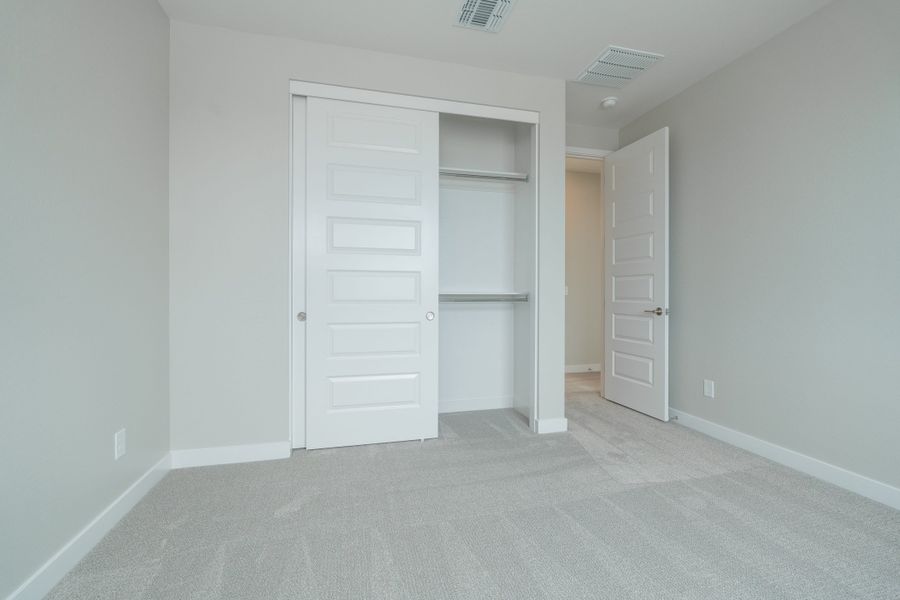 Spacious, unfurnished interior of a new home in Waterston Central, Gilbert (Image 16).