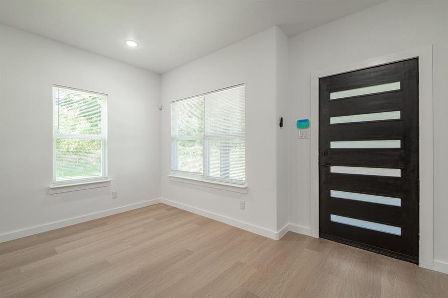 Foyer featuring light wood-type flooring and recessed lighting Foyer featuring light wood-type flooring and recessed lighting