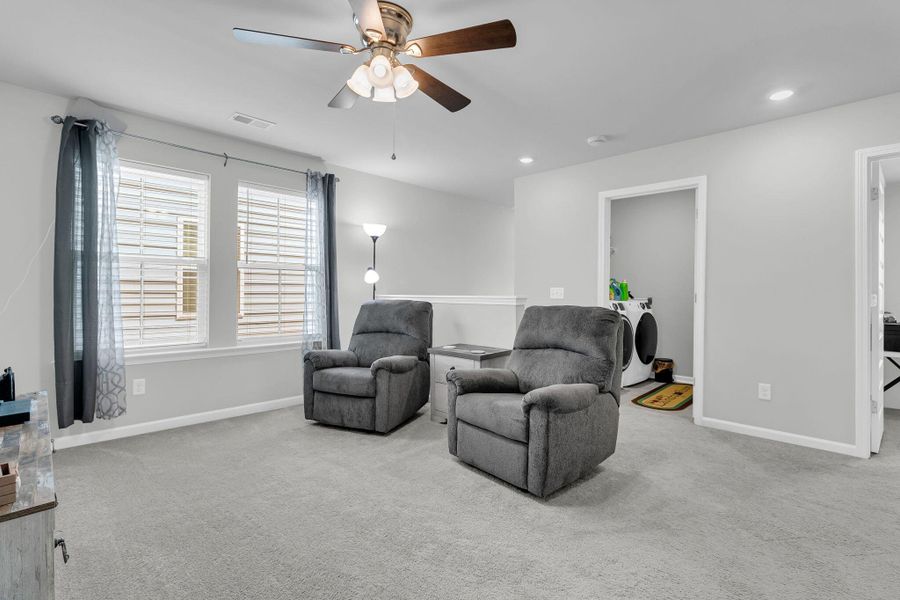 Furnished interior view inside a new home in Sweetgrass at Summers Corner, Summerville (Image 15).