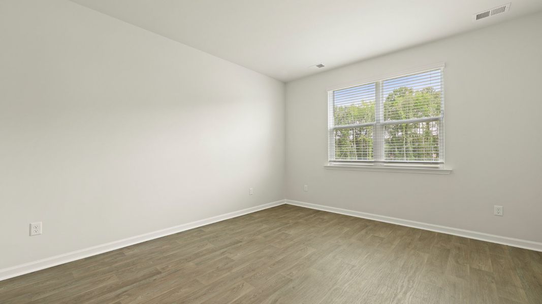 Spacious, unfurnished interior of a new home in Pine Hills at Cane Bay, Summerville (Image 16). Spacious, unfurnished interior of a new home in Pine Hills at Cane Bay, Summerville (Image 16).