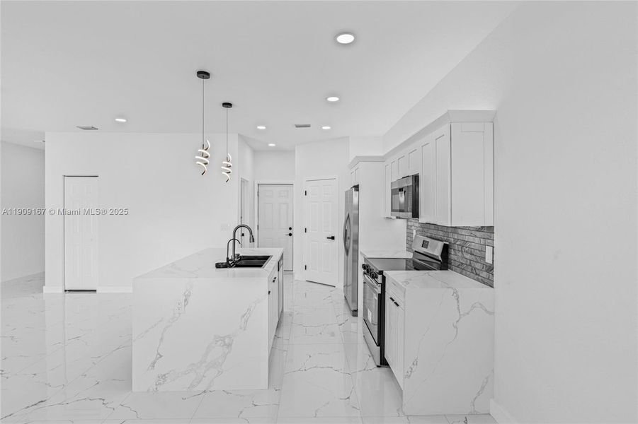 Furnished interior view inside a new home in , Cape Coral (Image 7). Furnished interior view inside a new home in , Cape Coral (Image 7).