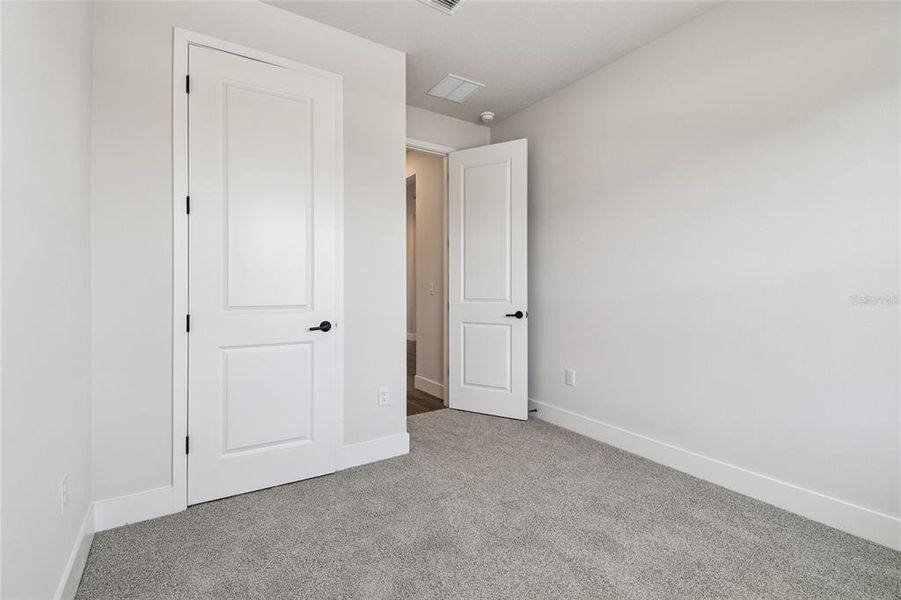 Spacious, unfurnished interior of a new home in Waterset Tradition Series, Apollo Beach (Image 30).