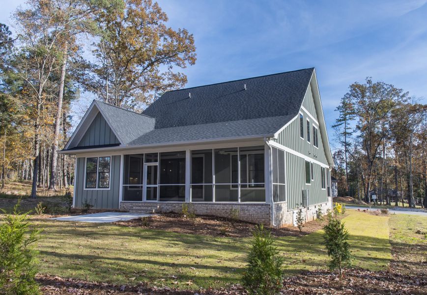 Exterior details and patio area of a home in , Chapin (Image 35).