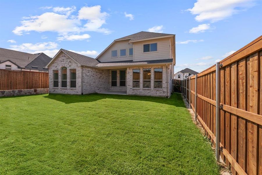 Exterior details and patio area of a home in Hillside Village, Celina (Image 22).