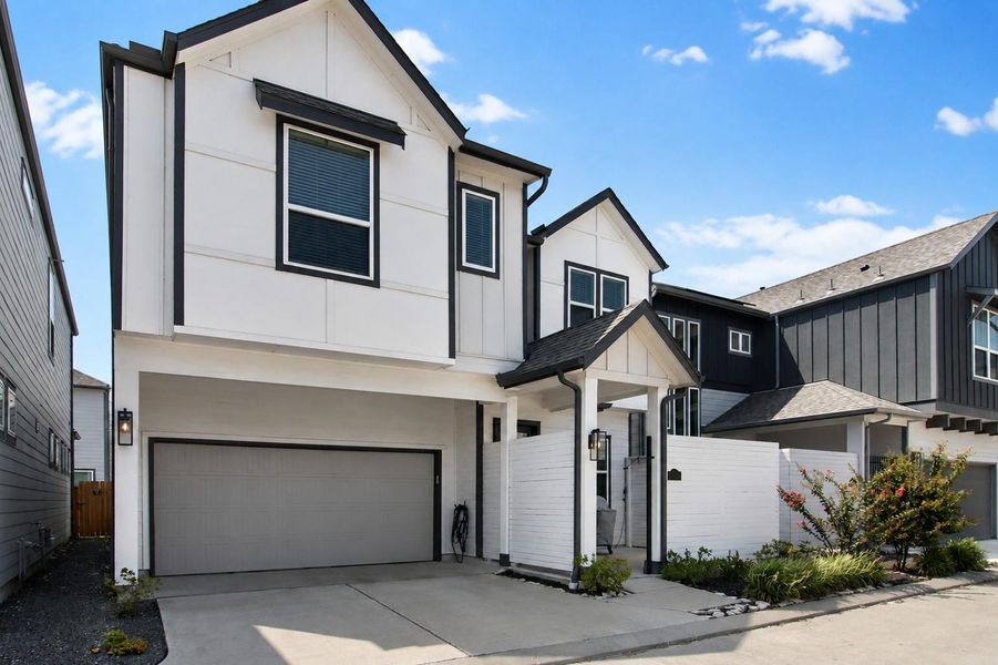 Front exterior of a new home in , Houston, TX, highlighting curb appeal (Image 2).