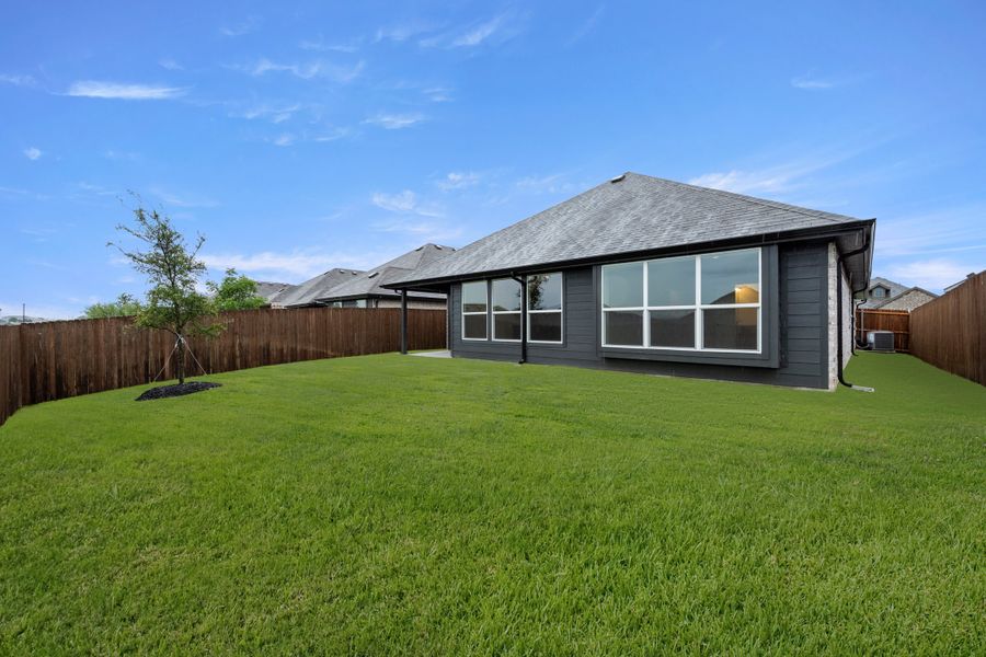 Exterior details and patio area of a home in Chisholm Hills, Cleburne (Image 18).