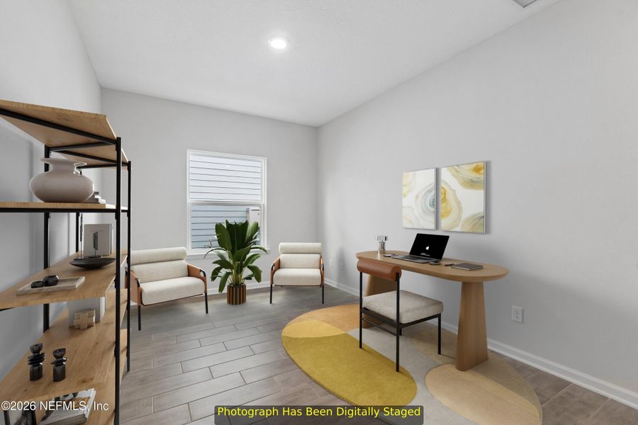 Furnished interior view inside a new home in Tributary 50', Yulee (Image 13).
