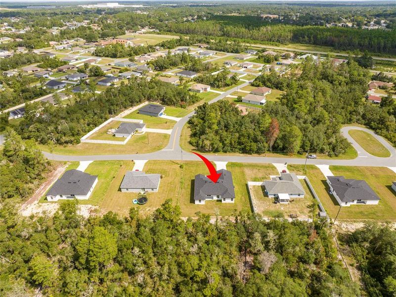Front exterior of a new home in , Ocala, FL, highlighting curb appeal (Image 33).