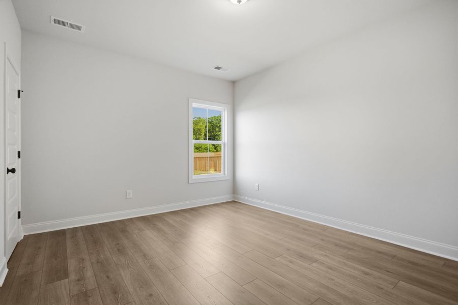 Spacious, unfurnished interior of a new home in Cherokee Knoll, Williamston (Image 28).