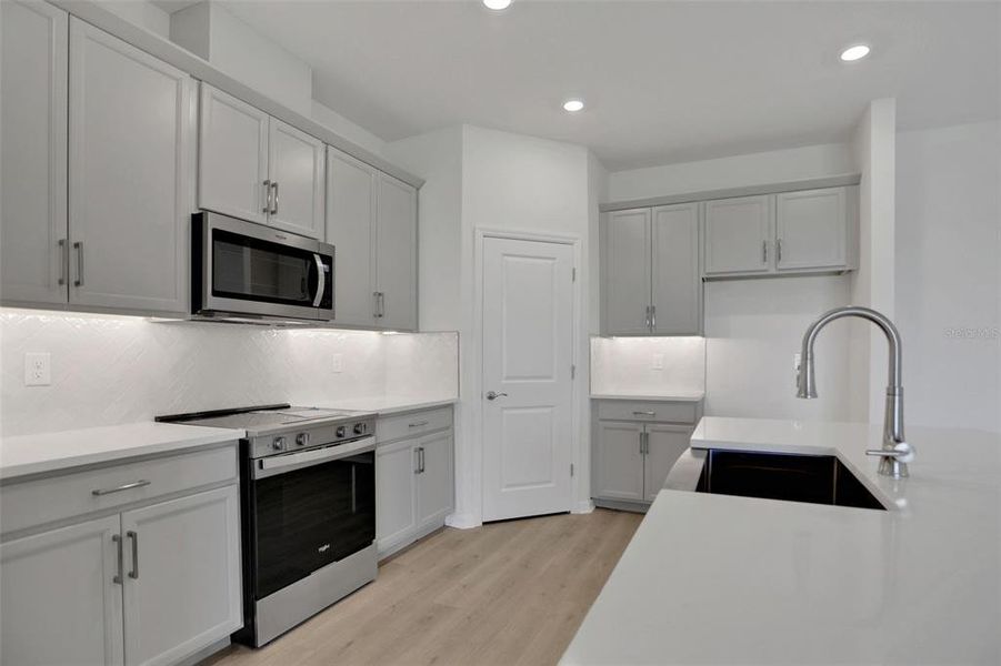 Furnished interior view inside a new home in Seaire, Parrish (Image 6).