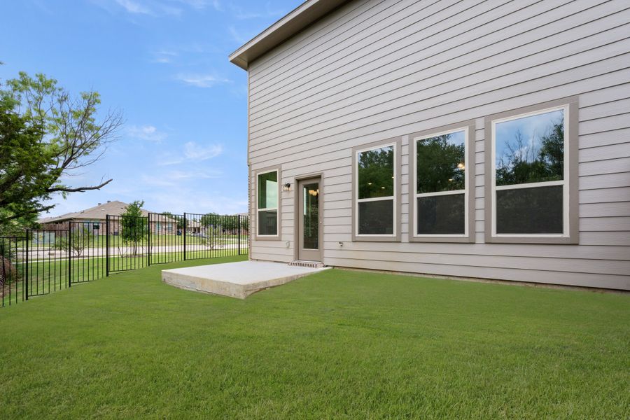Front exterior of a new home in Eagle Cove, Denton, TX, highlighting curb appeal (Image 20). Front exterior of a new home in Eagle Cove, Denton, TX, highlighting curb appeal (Image 20).