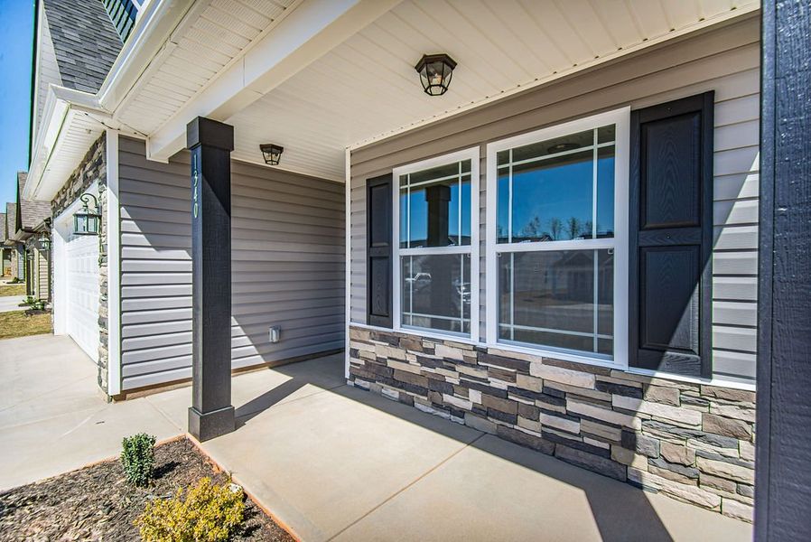 Representative exterior photo of a completed home built from the Bishop by Enchanted Homes in Ballentine Ridge, Lyman, SC (Image 26).