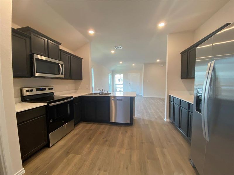 Furnished interior view inside a new home in Governor's Lots, Forney (Image 3).