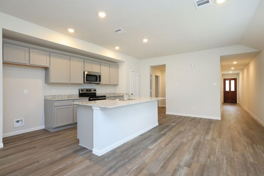 Pull up a barstool and enjoy a quick snack or help keep the cook company!