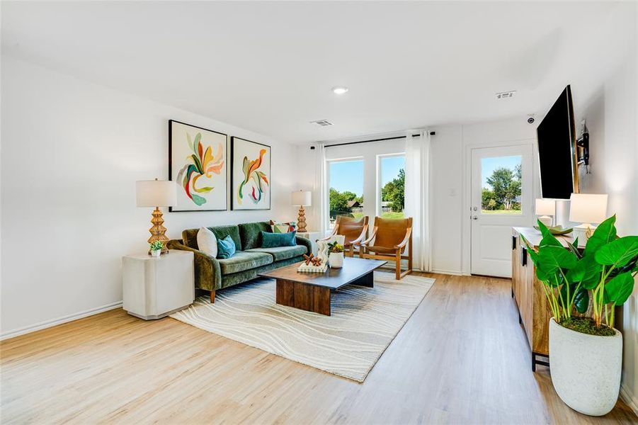 Living room featuring light hardwood / wood-style flooring