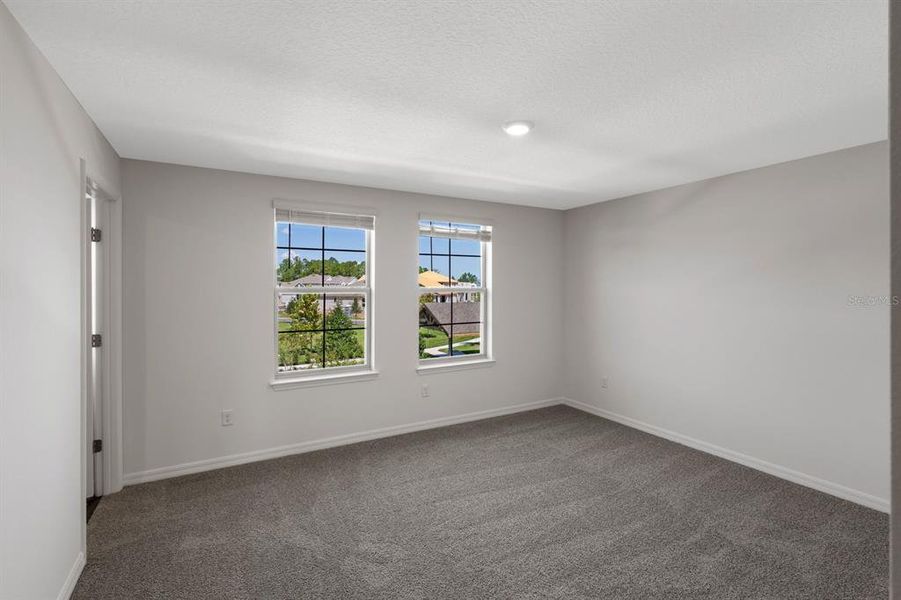 Spacious, unfurnished interior of a new home in Waterleigh, Winter Garden (Image 33).