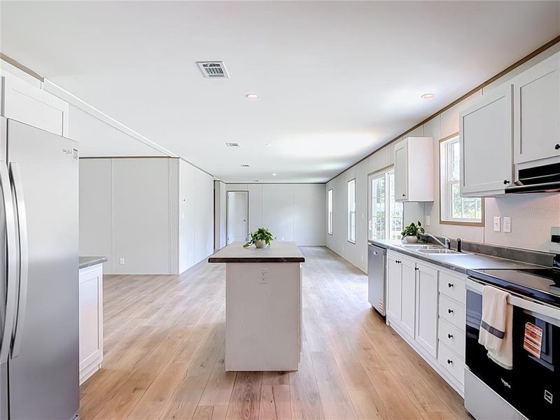 Furnished interior view inside a new home in , Deland (Image 6).
