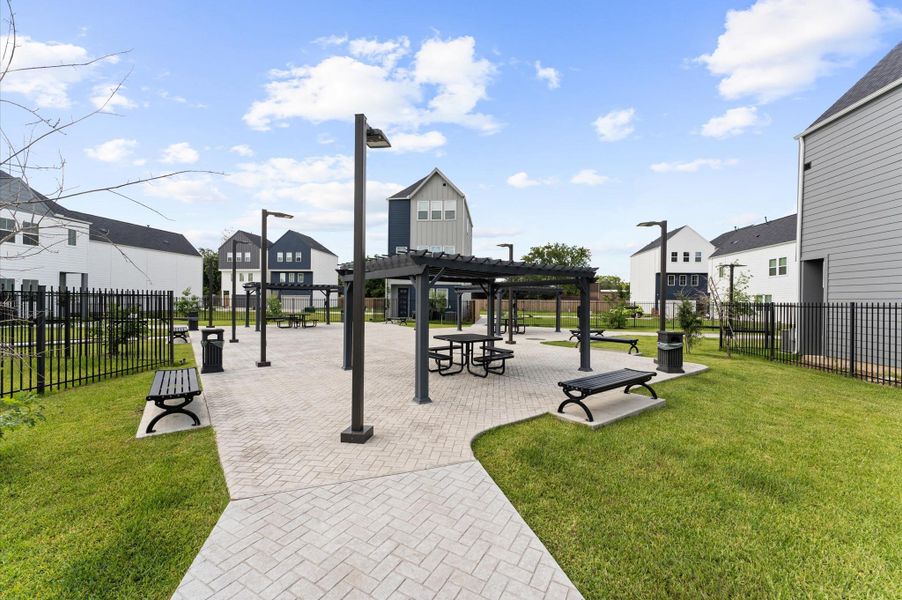 These pathways guide residents toward the heart of the neighborhood—a tranquil community courtyard.