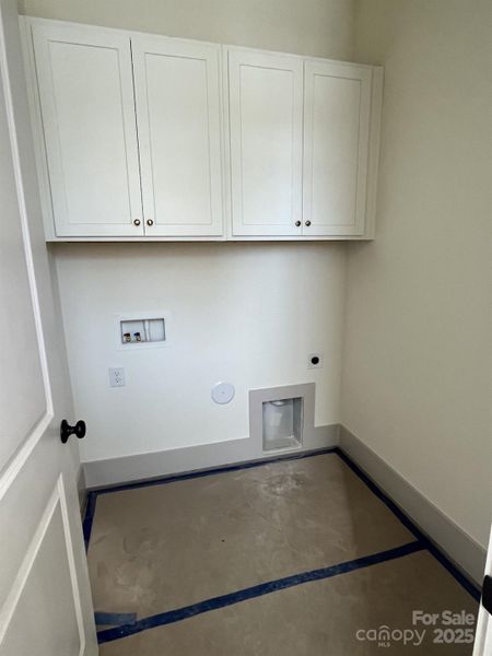 Laundry Room with Additional Cabinetry