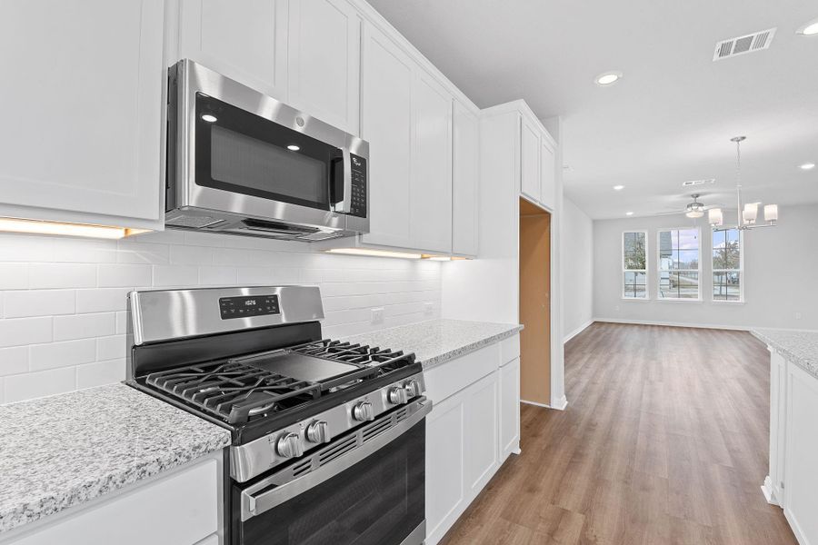 Furnished interior view inside a new home in Retreat at Hero Way, Leander (Image 12).