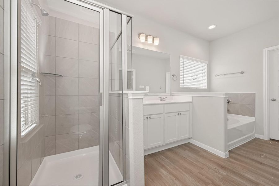 Furnished interior view inside a new home in Woodland Lakes, Huffman (Image 9).