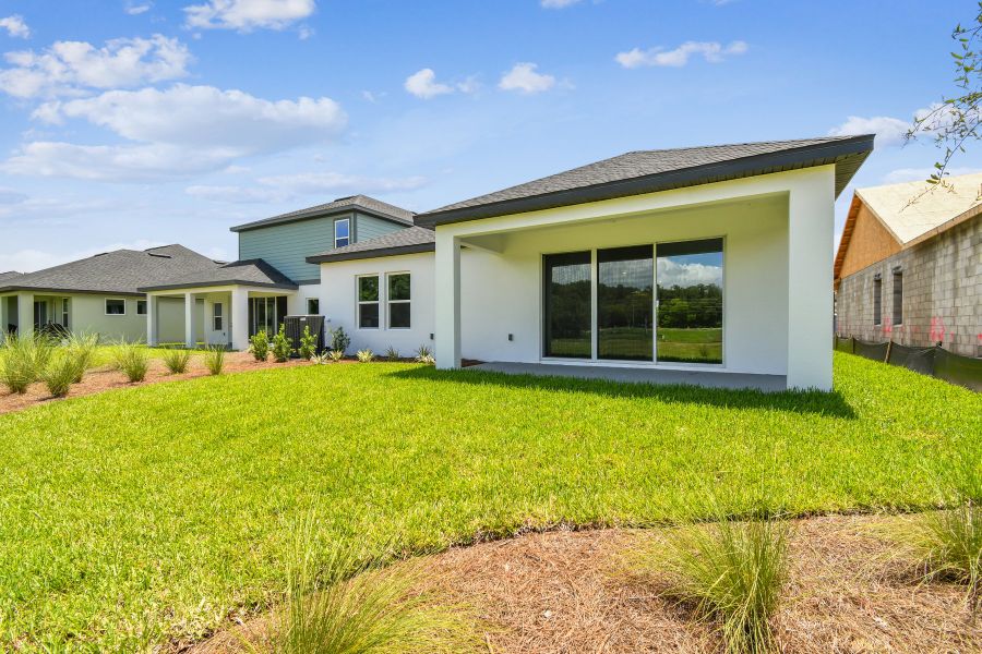 Representative exterior details of a home built from the The Sparkman by David Weekley Homes in Palmeras at Crossprairie – The Grove Collection, St. Cloud (Image 3).