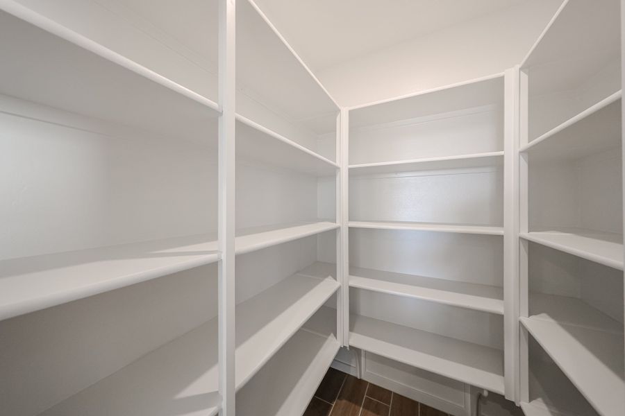 A white shelf with white shelves. A white shelf with white shelves.