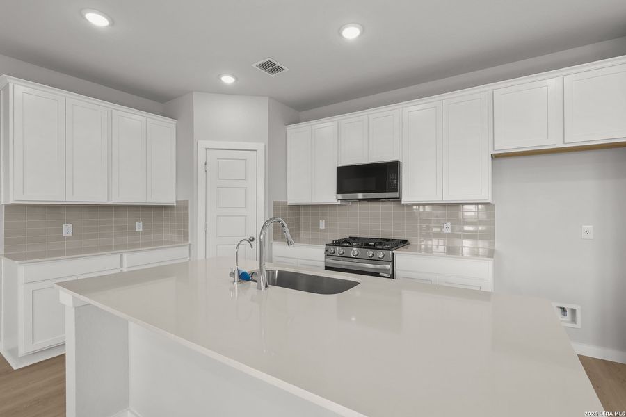 Furnished interior view inside a new home in Senna, Leon Valley (Image 6).