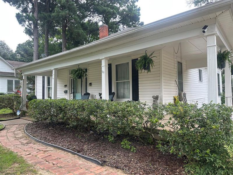 Front exterior of a new home in , Paris, TX, highlighting curb appeal (Image 18). Front exterior of a new home in , Paris, TX, highlighting curb appeal (Image 18).