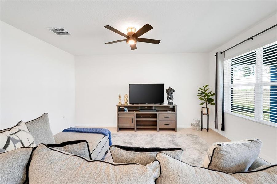 Furnished interior view inside a new home in Westridge Park, Zellwood (Image 15).