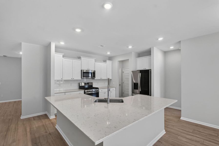 Furnished interior view inside a new home in Sweetgrass at Summers Corner, Summerville (Image 6).