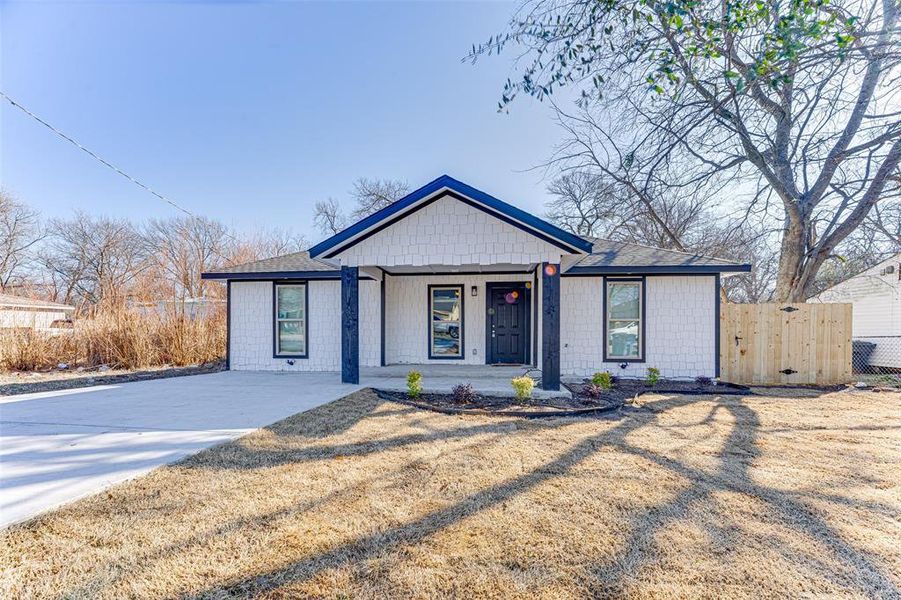 View of front of home featuring covered porch