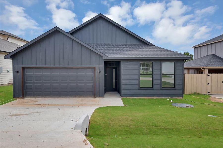 Front exterior of a new home in , Granbury, TX, highlighting curb appeal (Image 18).
