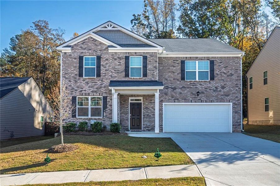 Front exterior of a new home in , Stonecrest, GA, highlighting curb appeal (Image 26).
