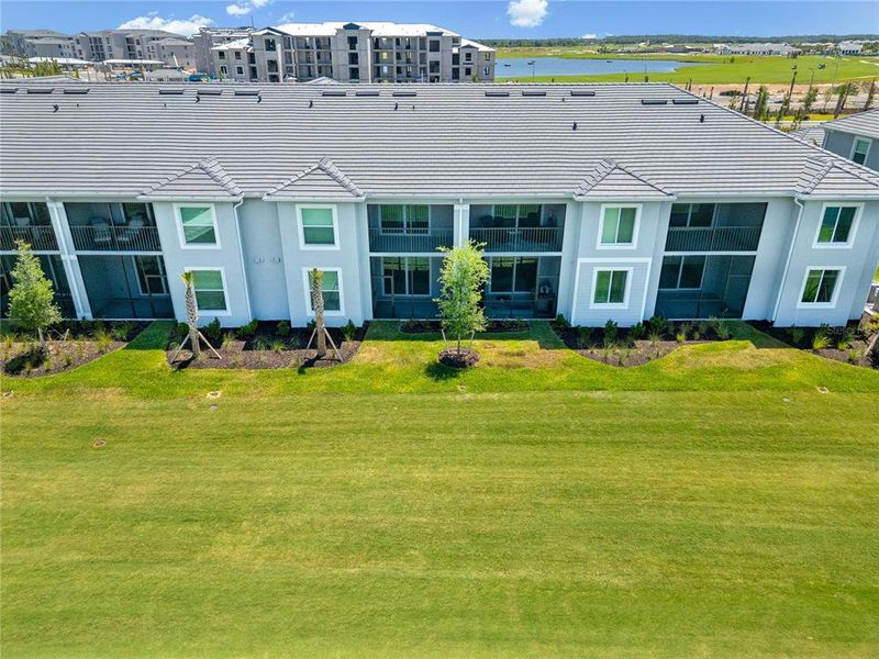 Front exterior of a new home in Calusa Country Club, Lakewood Ranch, FL, highlighting curb appeal (Image 28).