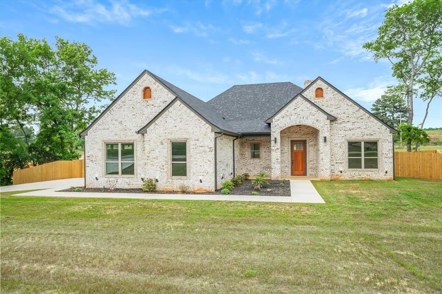 Front exterior of a new home in , Lindale, TX, highlighting curb appeal (Image 27).