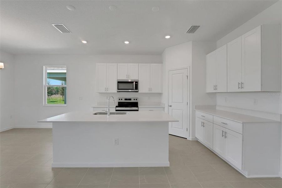 Furnished interior view inside a new home in Willowbrook North, Winter Haven (Image 8).